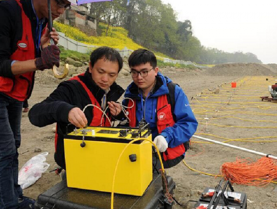 Joint research team setting up survey equipment
