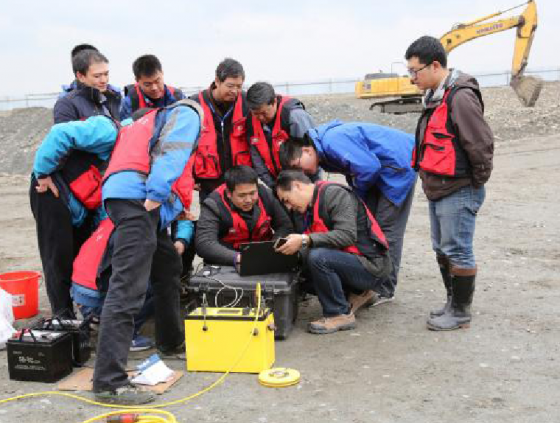 Joint research team looking at data