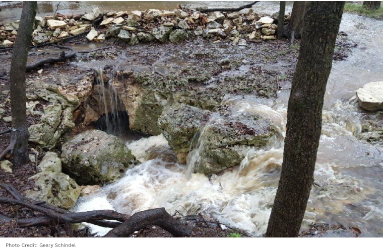 Water disappearing into a sinkhole