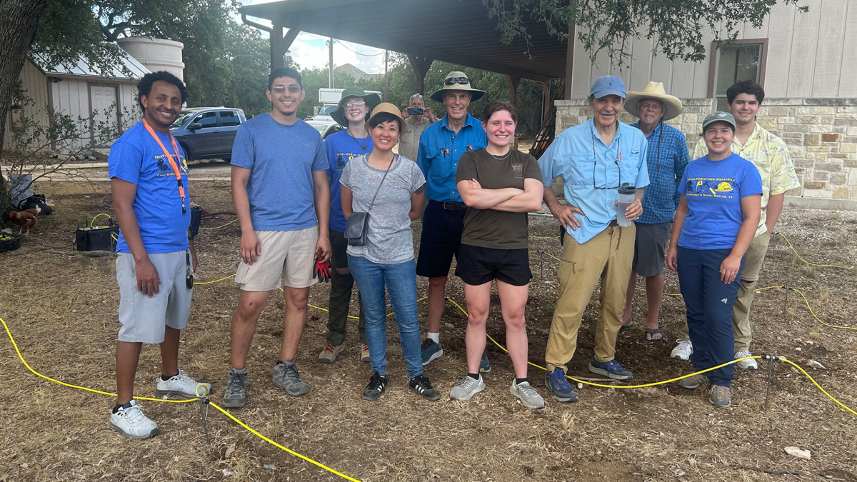 A group of people participating in a 3D resistivity imaging demonstration