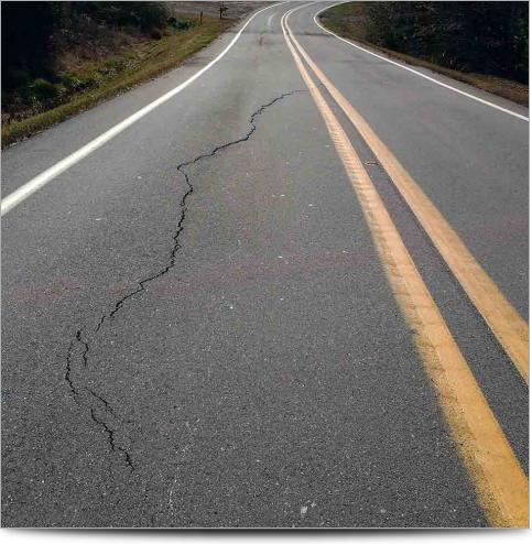 AGI Case History - Ozark Landslide - Cracked Road